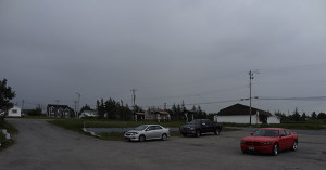 Surrounded by storm clouds.